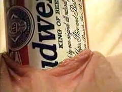 7X3.net presents: Extreme object insertion using a budweiser beer can