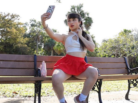 7X3.net presents: Gorgeous solo college babe doing striptease in a park - pixie