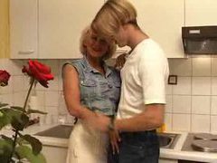 7X3.net presents: Fucking his busty aunt in the kitchen