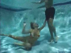7X3.net presents: She has a threesome underwater