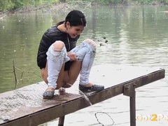 7X3.net presents: Public pissing girl in jeans goes in two places