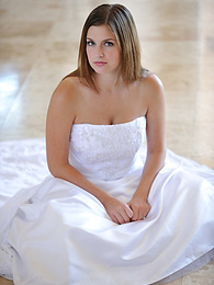 7X3.net presents: Busty glamorous amateur Danielle models wedding gown indoors & by the pool
