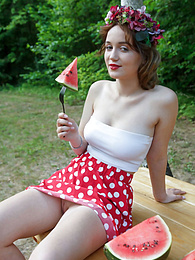 7X3.net presents: Nice belarusian stunner Rokki removes all clothes on a blanket in a backyard