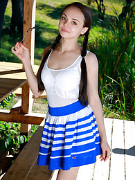 7X3.net presents: Fresh-Faced russian beauty Mia Grandy gets totally naked on a picnic table in a garden